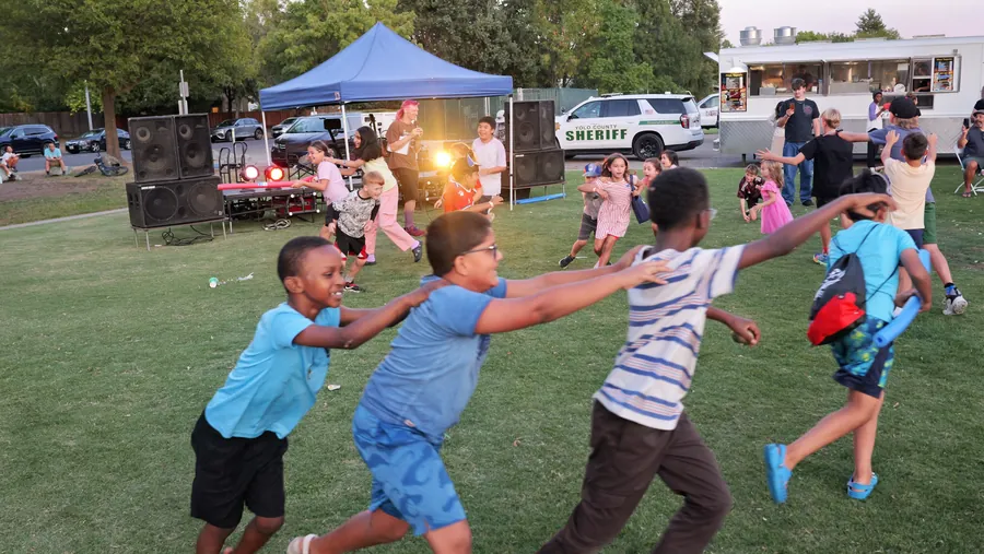 Families enjoying Family Fun Fest at Community Park